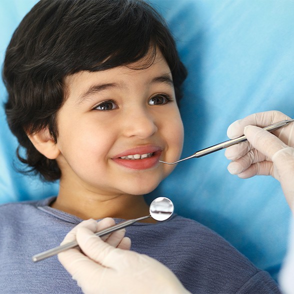 A child receiving dental treatment