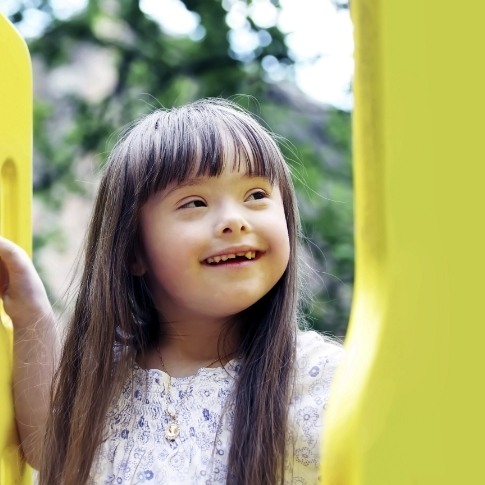 Young girl outdoors smiling