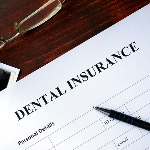 a close-up of a dental insurance form