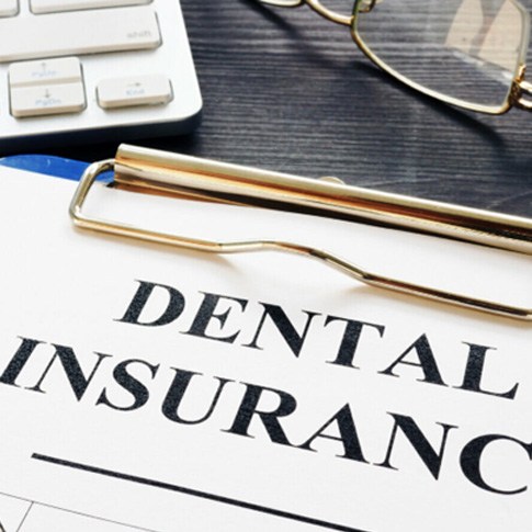 a closeup of a dental insurance form 