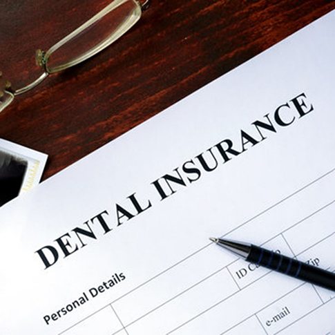 a closeup of a dental insurance form