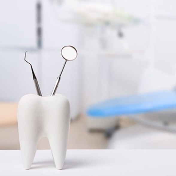 an empty treatment chair at a dental office