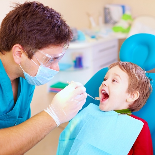 Child visiting dentist for pediatric preventive dentistry in Worcester Massachusetts