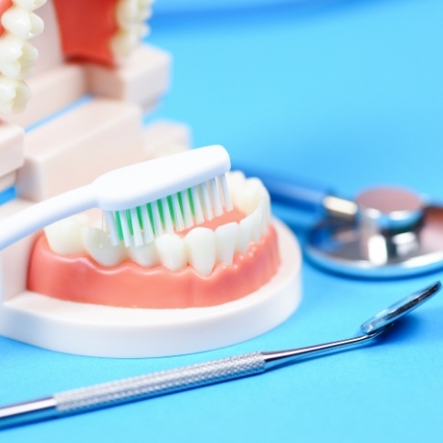 Model smile used to explain oral health risk assessment