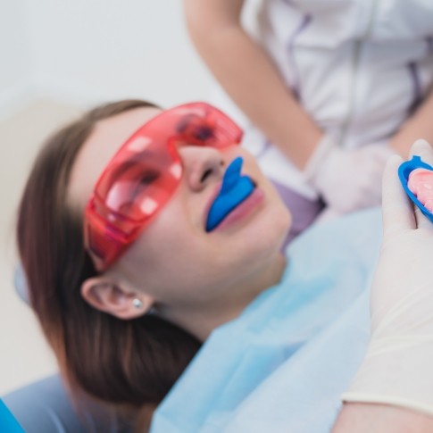 Child receiving silver diamine fluoride treatment