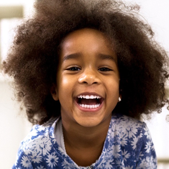 Young girl with dental sealants in Worcester smiling