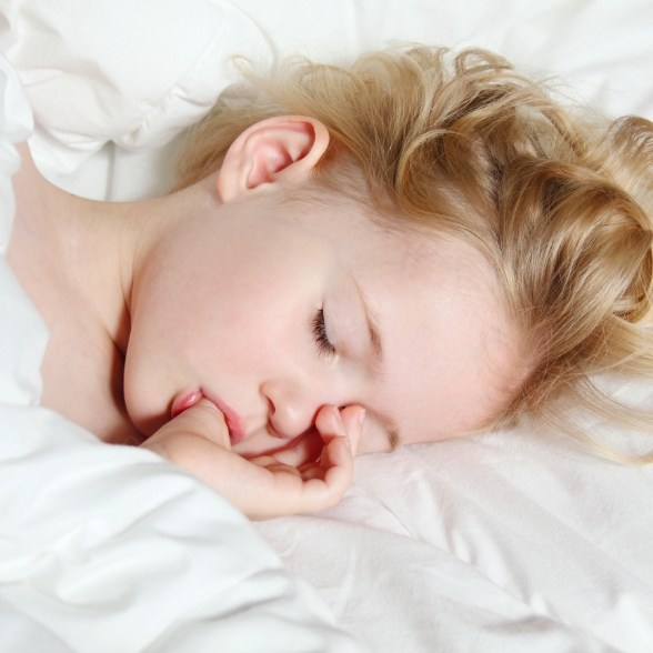 Child resting after pediatric sedation dentistry in Worcester Massachusetts