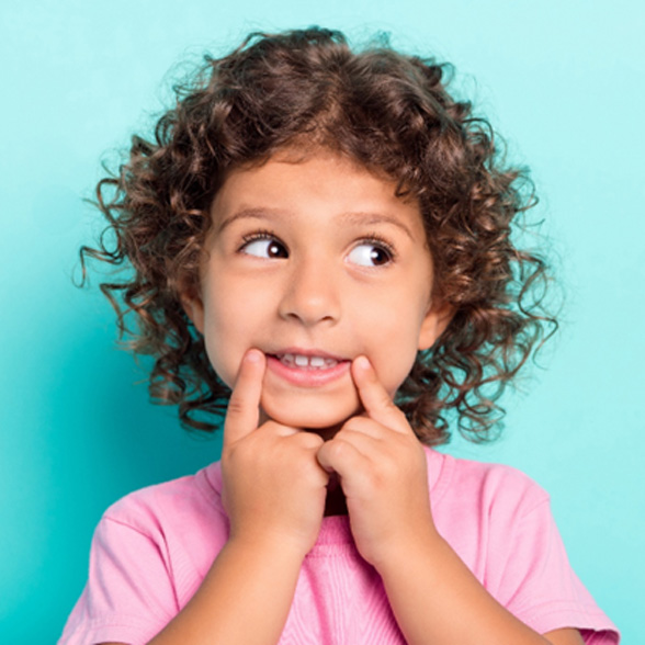 a close-up of a child smiling 